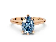 Solitaire Engagement Ring Setting for Fancy Blue Pear-Shaped Center with Cathedral Band and Prong Head in Rose Gold