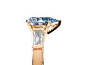 3 Stone Engagement Ring Setting for Fancy Blue Pear-Shaped Center with Channel Baguette Accents and Prong Head in Rose Gold