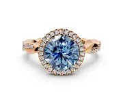 Halo Engagement Ring Setting for Fancy Blue Round Cut Center with Pave and Plain Twist Band and Prong Head in Rose Gold