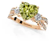 3 Stone Engagement Ring Setting for Fancy Yellow Heart-Shaped Center with Pave Twist Band and Prong Head in Rose Gold