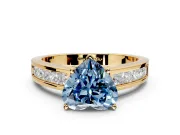 Solitaire Engagement Ring Setting for Fancy Blue Heart-Shaped Center with Princess Cut Channel Band and Prong Head in Yellow Gold