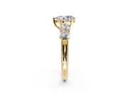 5 Stone Engagement Ring Setting for Pear-Shaped Center with Graduated Accents and Prong Head in Yellow Gold