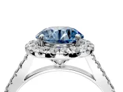 Halo Engagement Ring Setting for Fancy Blue Round Cut Center with Narrowing Pave Band and Prong Head in White Gold