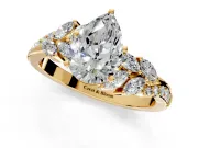 Solitaire Engagement Ring Setting for Pear-Shaped Center with Marquise Accent Twist Band and Prong Head in Yellow Gold