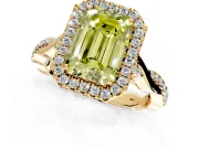 Halo Engagement Ring Setting for Fancy Yellow Emerald Cut Center with Twist Band and Prong Head in Yellow Gold