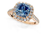 Halo Engagement Ring Setting for Fancy Blue Cushion Cut Center with Narrowing Pave Band and Prong Head in Rose Gold