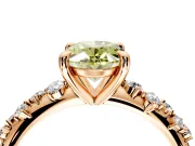 Solitaire Engagement Ring Setting for Fancy Yellow Oval Center with Trailing Leaf Accent Band and Prong Head in Rose Gold