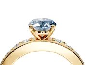 Solitaire Engagement Ring Setting for Fancy Blue Oval Center with Channel-Set Accents and Prong Head in Yellow Gold