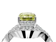Halo Engagement Ring Setting for Fancy Yellow Radiant Cut Center with Pave Infinity Twist Band and Prong Head in White Gold