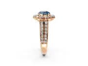 Large Accent Halo Engagement Ring Setting for Fancy Blue Round Cut Center with Pave Split Shank and Prong Head in Rose Gold