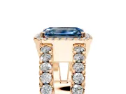 Halo Engagement Ring Setting for Fancy Blue Emerald Cut Center with Wide-Open Pave Split Shank and Prong Head in Rose Gold
