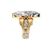 Solitaire Engagement Ring Setting for Marquise Center with Marquise and Bezel Accents and Prong Head in Yellow Gold