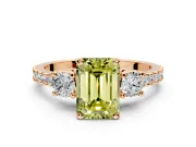 3 Stone Engagement Ring Setting for Fancy Yellow Emerald Cut Center with Round Cut Side Accents and Prong Head in Rose Gold