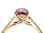 Solitaire Engagement Ring Setting for Fancy Pink Emerald Cut Center with Round Cut Channel Band and Prong Head in Yellow Gold