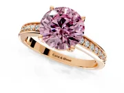Solitaire Engagement Ring Setting for Fancy Pink Round Cut Center with Channel-Set Accent Band and Prong Head in Rose Gold