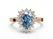 Starburst Halo Engagement Ring Setting for Fancy Blue Pear-Shaped Center with Flat Cathedral Band and Prong Head in Rose Gold