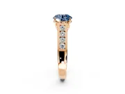 Solitaire Engagement Ring Setting for Fancy Blue Round Cut Center with Cathedral Channel Band and Prong Head in Rose Gold