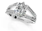 Split Shank Engagement Ring Setting for Pear-Shaped Center with Pave Split Shank and Prong Head in Platinum