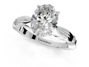 Solitaire Engagement Ring Setting for Oval Center with Carved Leaf Shoulders and Prong Head in Platinum