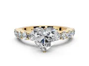 Shared-Prong Engagement Ring Setting for Heart-Shaped Center with Graduated Accents and Prong Head in Yellow Gold