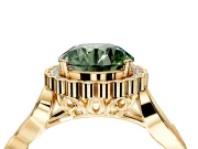 Halo Engagement Ring Setting for Fancy Green Round Cut Center with Leaf Motif Split Shank and Prong Head in Yellow Gold