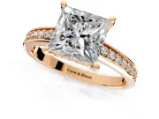 Solitaire Engagement Ring Setting for Princess Cut Center with Channel-Set Accent Band and Prong Head in Rose Gold