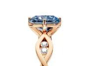 Solitaire Engagement Ring Setting for Fancy Blue Radiant Cut Center with Accented Twist Band and Leaf Prong Head in Rose Gold
