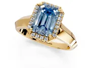 Halo Engagement Ring Setting for Fancy Blue Emerald Cut Center with Knife Ridge Cathedral Band and Prong Head in Yellow Gold