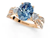 3 Stone Engagement Ring Setting for Fancy Blue Oval Center with Pave Twist Band and Prong Head in Rose Gold