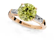 3 Stone Engagement Ring Setting for Fancy Yellow Round Cut Center with Tapered Baguettes, Plain Band and Prong Head in Rose Gold