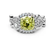 Halo Engagement Ring Setting for Fancy Yellow Cushion Cut Center with Leaf Motif Split Shank and Prong Head in Platinum
