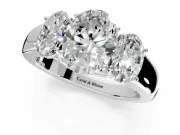 3 Stone Engagement Ring Setting for Oval Center with Raised Basket Heads and Prong Head in Platinum