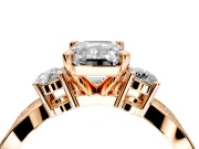 3 Stone Engagement Ring Setting for Emerald Cut Center with Pave Twist Band and Prong Head in Rose Gold