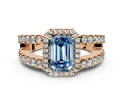 Halo Engagement Ring Setting for Fancy Blue Emerald Cut Center with Wide-Open Pave Split Shank and Prong Head in Rose Gold