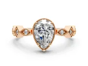 Milgrain Bezel Engagement Ring Setting for Pear-Shaped Center with Marquise Stations and Bezel Head in Rose Gold