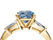 3 Stone Engagement Ring Setting for Fancy Blue Cushion Cut Center with Channel Baguette Accents and Prong Head in Yellow Gold
