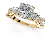 3 Stone Engagement Ring Setting for Cushion Cut Center with Pave Split Shank and Prong Head in Yellow Gold