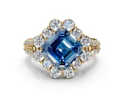 Large Accent Halo Engagement Ring Setting for Fancy Blue Asscher Cut Center with Pave Split Shank and Prong Head in Yellow Gold