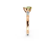 3 Stone Engagement Ring Setting for Fancy Yellow Heart-Shaped Center with Channel Baguette Accents and Prong Head in Rose Gold