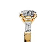 3 Stone Engagement Ring Setting for Round Cut Center with Tapered Baguettes, Plain Band and Prong Head in Yellow Gold