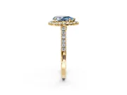 Halo Engagement Ring Setting for Fancy Blue Pear-Shaped Center with Narrowing Pave Band and Prong Head in Yellow Gold