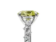 Solitaire Engagement Ring Setting for Fancy Yellow Oval Center with Trailing Leaf Accent Band and Prong Head in Sterling Silver