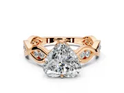 Solitaire Engagement Ring Setting for Heart-Shaped Center with Accented Twist Band and Leaf Prong Head in Rose Gold