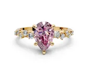 Solitaire Engagement Ring Setting for Fancy Pink Pear-Shaped Center with Trailing Leaf Accent Band and Prong Head in Yellow Gold