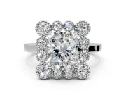 Cluster Halo Engagement Ring Setting for Radiant Cut Center with Milgrain Bezel Accents and Prong Head in Platinum