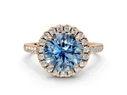Halo Engagement Ring Setting for Fancy Blue Round Cut Center with Raised Halo, Pave Band and Prong Head in Rose Gold