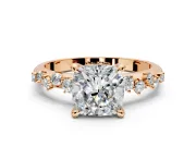 Solitaire Engagement Ring Setting for Cushion Cut Center with Trailing Leaf Accent Band and Prong Head in Rose Gold