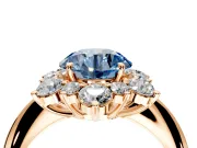 Small-Accent Cluster Halo Engagement Ring Setting for Fancy Blue Round Cut Center with Plain Band and Prong Head in Rose Gold