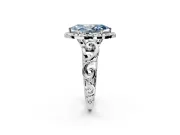 Halo Engagement Ring Setting for Fancy Blue Marquise Center with Open Scroll Shoulders and Prong Head in Platinum