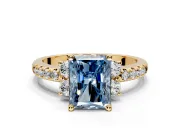 Paired Accent Engagement Ring Setting for Fancy Blue Radiant Cut Center with Pave Band and Prong Head in Yellow Gold